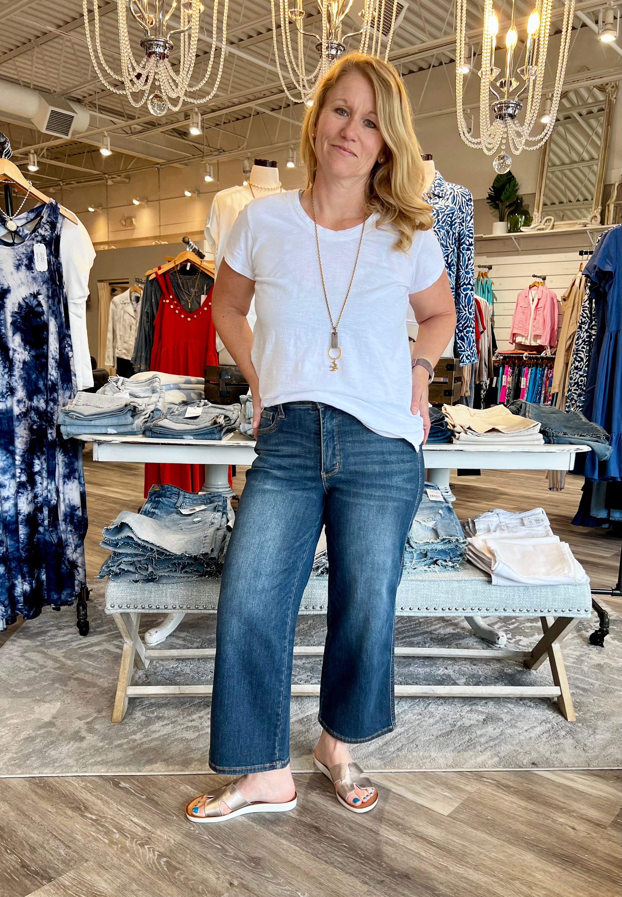 Introducing the latest in chic comfort: the Judy Blue wide leg cropped jeans, designed to revolutionize your wardrobe. These jeans are not just a fashion statement; they're an embodiment of style and functionality, perfect for anyone looking to enhance their wardrobe with a versatile piece that transitions seamlessly from day to night.