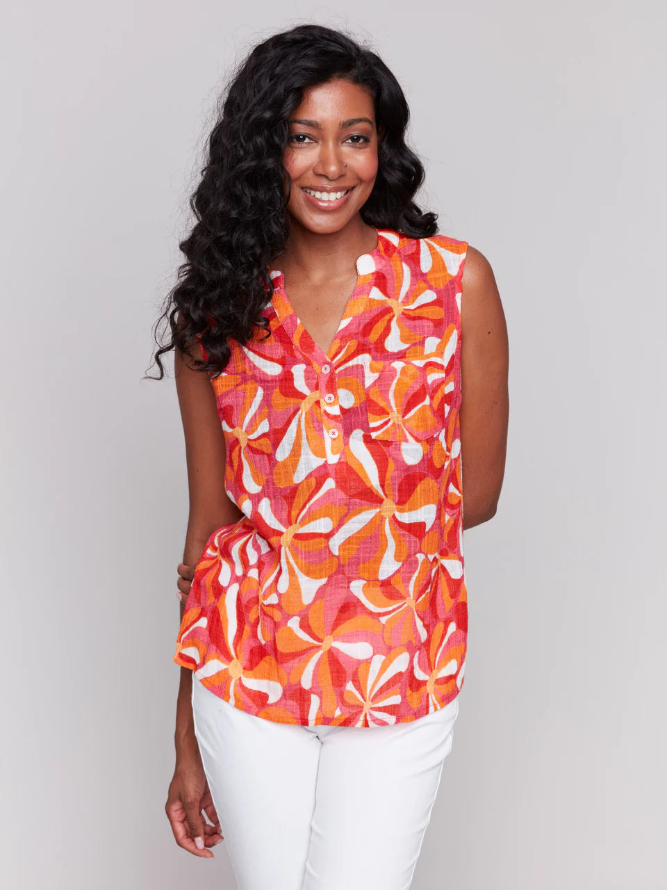 Transform your spring & summer wardrobe with this elegant, airy sleeveless shirt, featuring a stylish high-low hem. Perfect for bright sunny walks or laid-back casual gatherings, this breezy cotton top brings effortless style and comfort. Embrace the quintessential summer vibe and make it your go-to favorite for any occasion!
V-neck
High-low hem
Chest pocket
Abstract pattern
Sleeveless design
Groovy