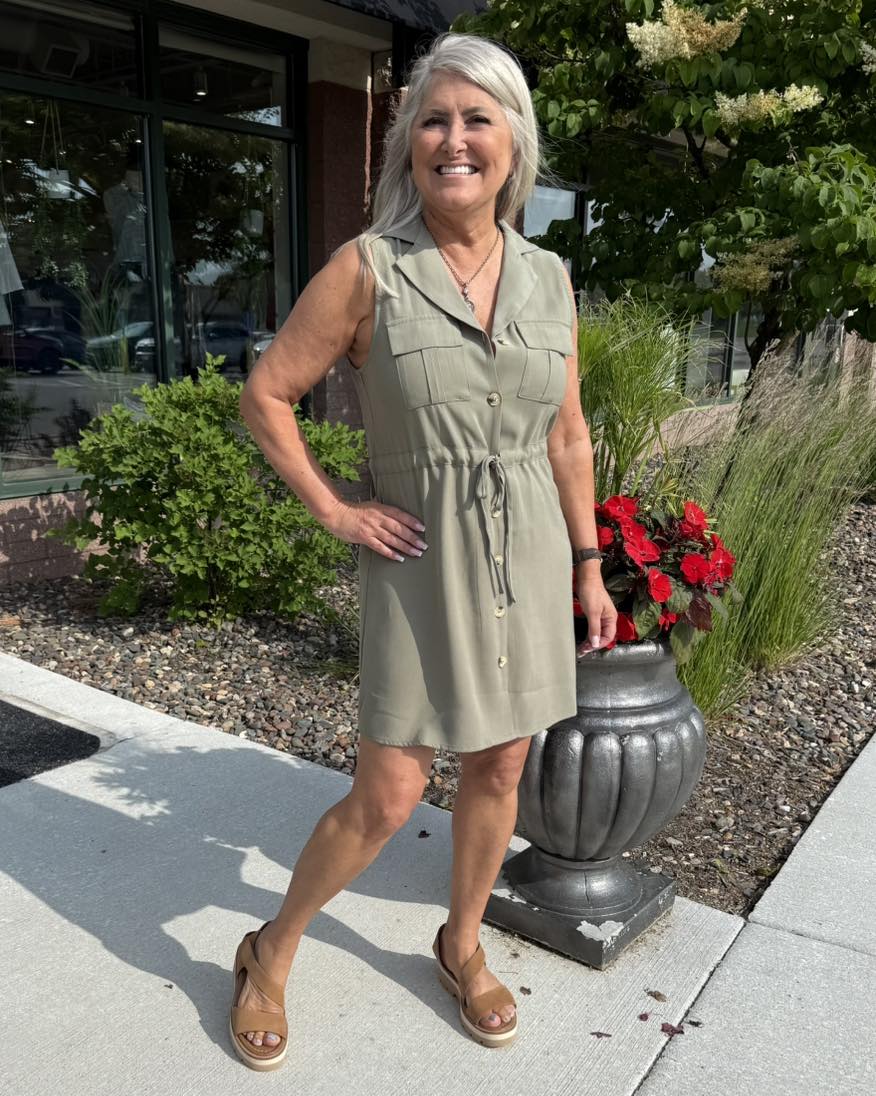 The Utility Tie Shirt dress is chic and effortless. This sleeveless dress is mini length, and has a V neck and button front. The drawstring waist ensures a flattering fit while the front chest pockets add a utility vibe. Add sandals or sneakers for an easy casual look.
· V Neck with Lapels
· Sleeveless
· Mini Length
· Button Front
· Drawstring Waist
· Front Chest Pockets
· 92% Viscose, 8% Polyeste