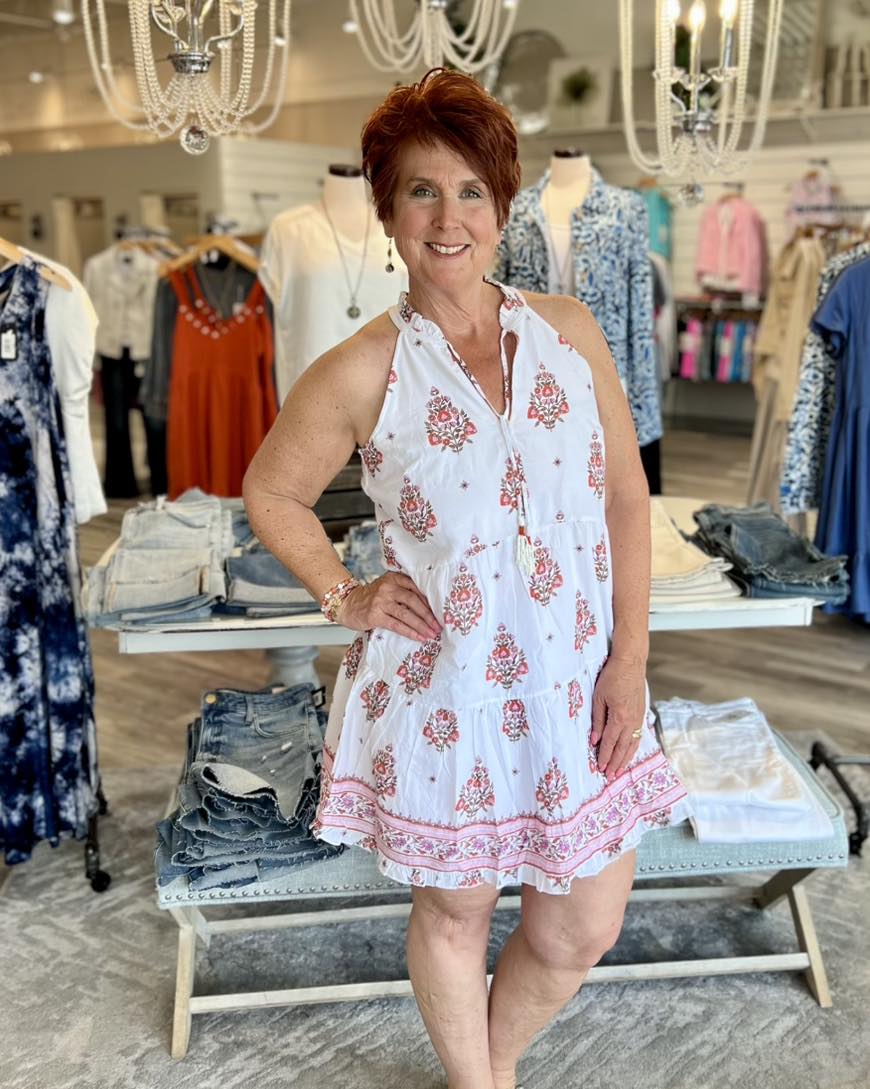 The flowy and girly Amelia Island Sleeveless Tiered Dress is perfect for every day and vacay. The floral emblem print is accented with fun beaded tassels. The new woven printed fabric features a comfortable sun protective lining underneath. This lightweight style is perfect to pair with a cardigan or jean jacket on cooler nights.