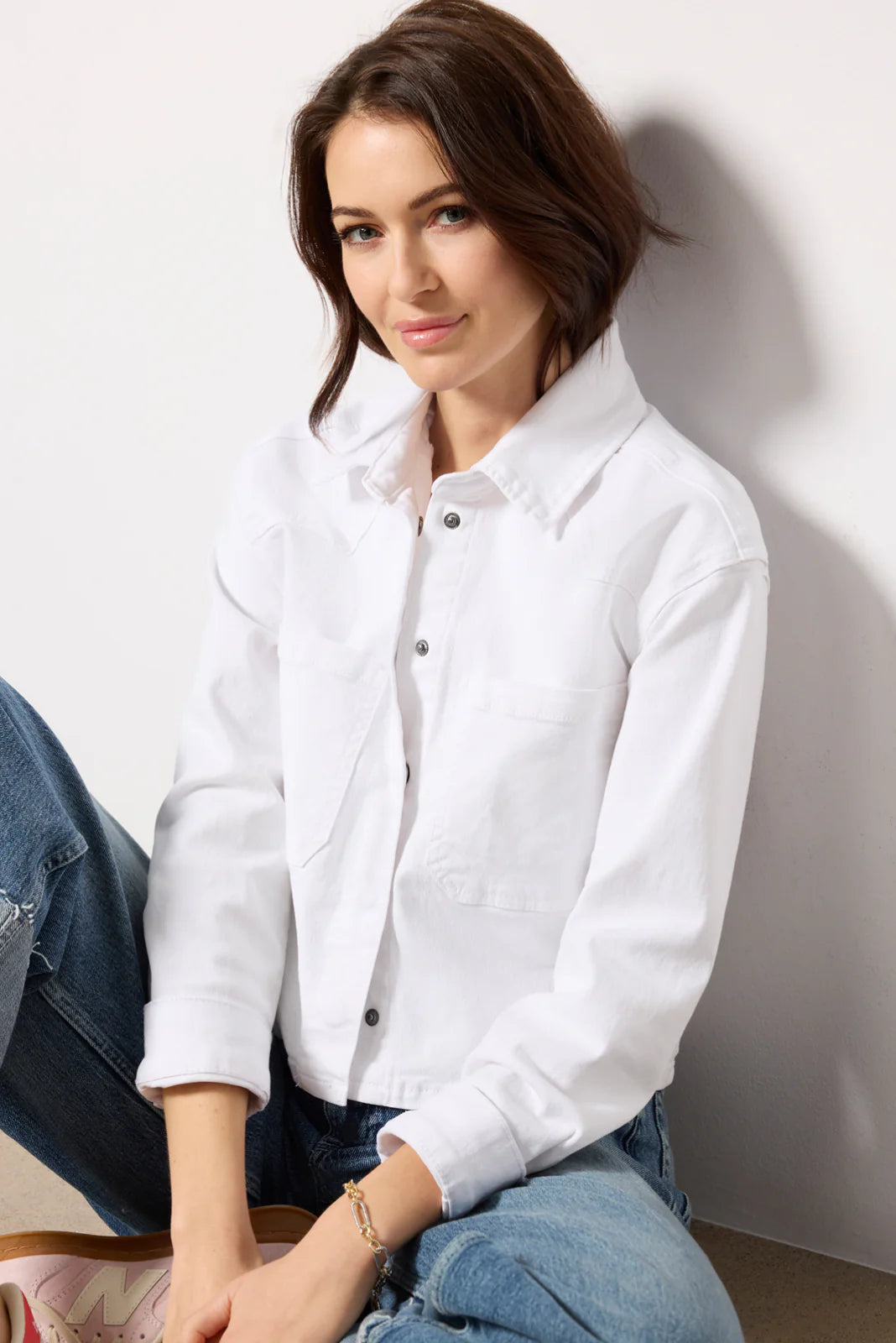 Ride off into the sunset in this stretch-denim jacket sporting a Western front yoke and a modern, cropped length.

20" length
Front snap closure
Spread collar
Snap cuffs
Chest patch pockets
98% cotton, 2% spandex