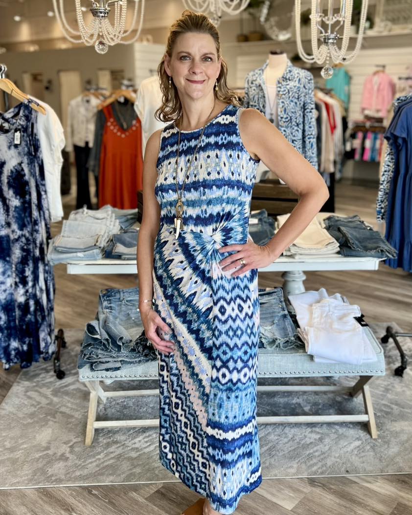 Prepare to captivate in our chic summer cotton dress, crafted for elegance and supreme comfort. Showcasing a bold Lake Tahoe blue print on exceptionally soft fabric, the faux knot detail beautifully defines your silhouette, adding a modern touch. Ideal for women desiring light and trendy outfits, this dress is a must-have for your spring-summer wardrobe.

Midi length
Round neckline
Faux knot detail at the waist
Abstract pattern
Sleeveless design
100% cotton