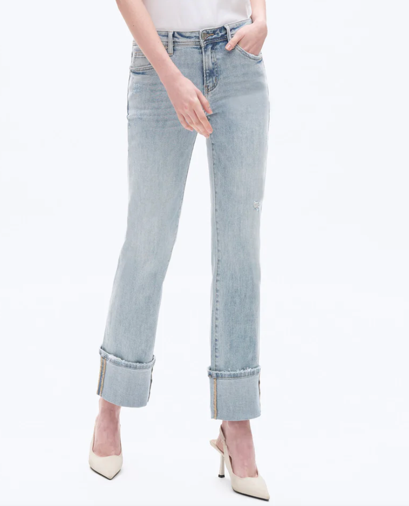 Crafted from high-stretch denim, these jeans feature a classic five-pocket design with a distressed front panel. The waistband is adorned with a double stitching detail and has a raw-edge finish at the back. Distressed hems and a cuffed ankle complete the look.
Light Blue
