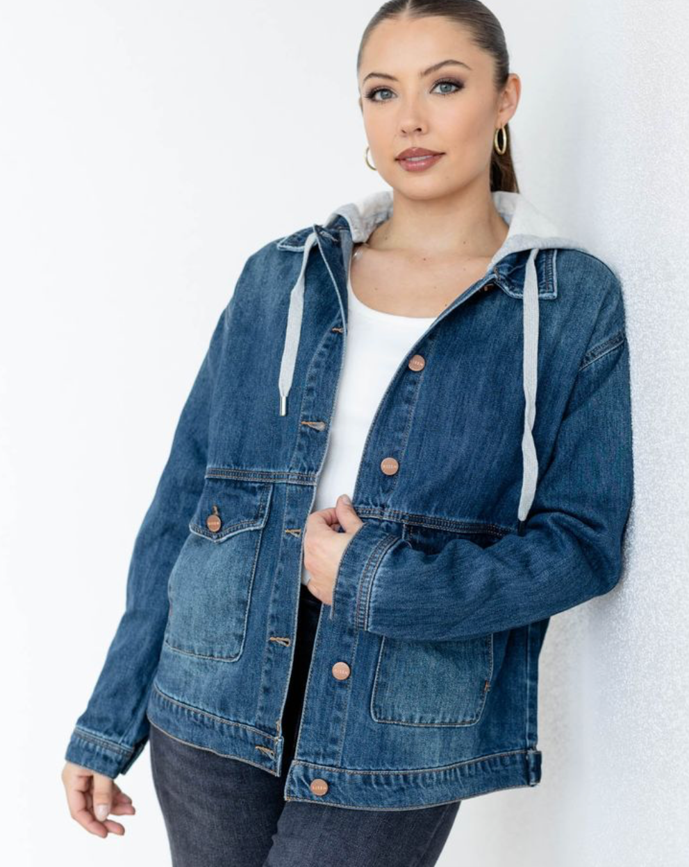 We love the oversized nature of this jacket from RISEN to give a super casual and laid back layering option into your wardrobe. This denim jacket features a removable hooded accent to totally switch up the look and feel of this jacket. An overall relaxed look and feel provides effortless style to your everyday attire.
