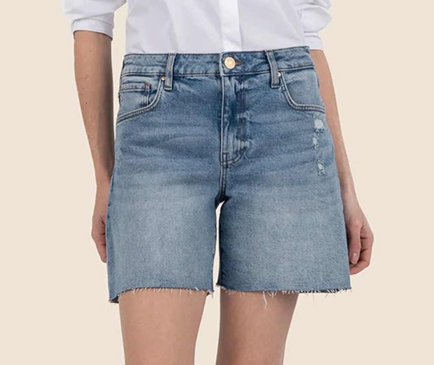 These high rise shorts feature a longer inseam, medium wash, and subtle distressing on the front and back, and raw hem for a stylish, laid back look. Perfect for everyday wear.
Fabric:&nbsp;99% Cotton, 1% Spandex
Size &amp; Fit:&nbsp;Inseam: 6", Leg Opening: 24 3/4", Rise: 10 1/2"
Color:&nbsp;&nbsp;FOCUS W/MED BASE WASH