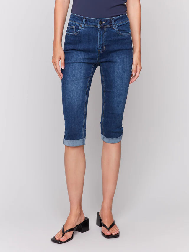 Upgrade your style with these denim pedal pushers! They have a slim leg for a sleek look and a versatile folded hem. The stretchy denim provides comfort and flexibility, while the indigo blue color adds a touch of sophistication. Great for wearing with sandals or sneakers for a cool, casual outfit all spring and summer.

Slim fit
Cropped length
Folded hem
Five-pocket design
Stretch denim
Mid-rise waist