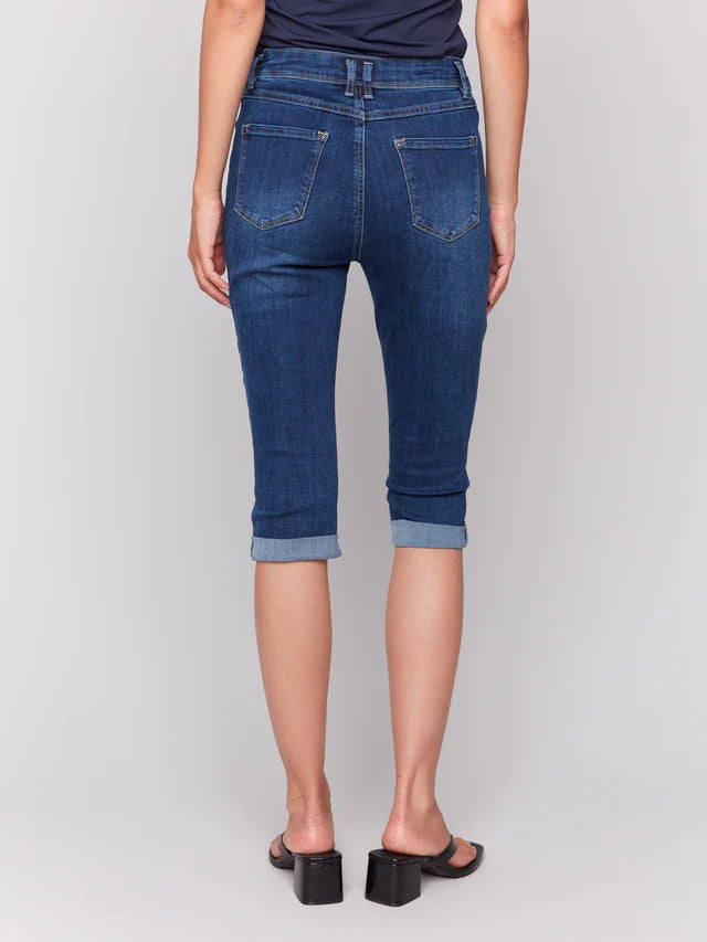 Upgrade your style with these denim pedal pushers! They have a slim leg for a sleek look and a versatile folded hem. The stretchy denim provides comfort and flexibility, while the indigo blue color adds a touch of sophistication. Great for wearing with sandals or sneakers for a cool, casual outfit all spring and summer.

Slim fit
Cropped length
Folded hem
Five-pocket design
Stretch denim
Mid-rise waist