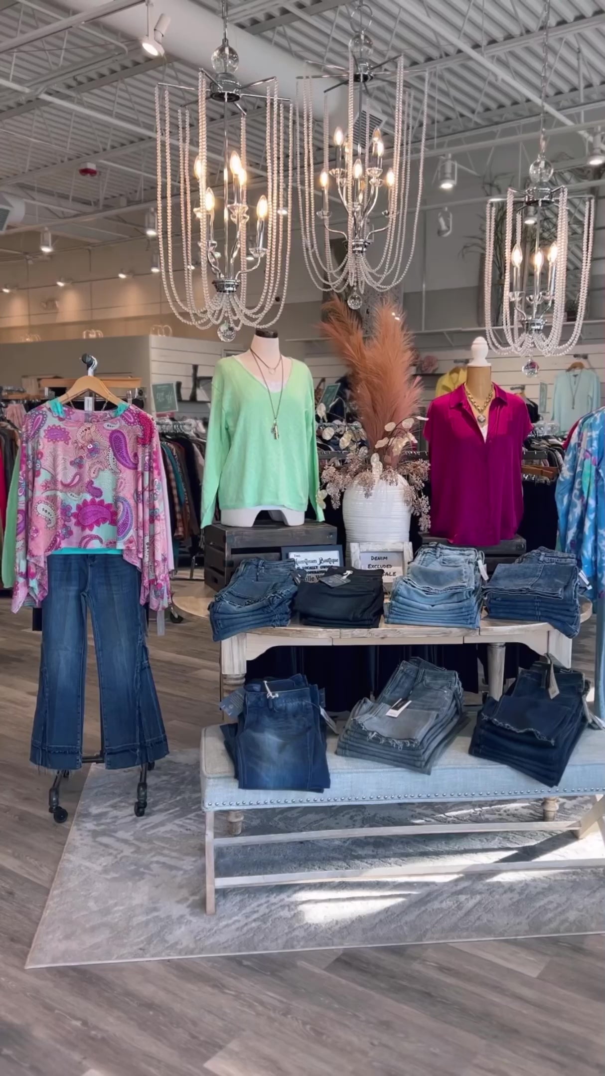 Mainstream boutique video of store featuring new spring women's clothing, jewelry, shoes, denim and other bottoms